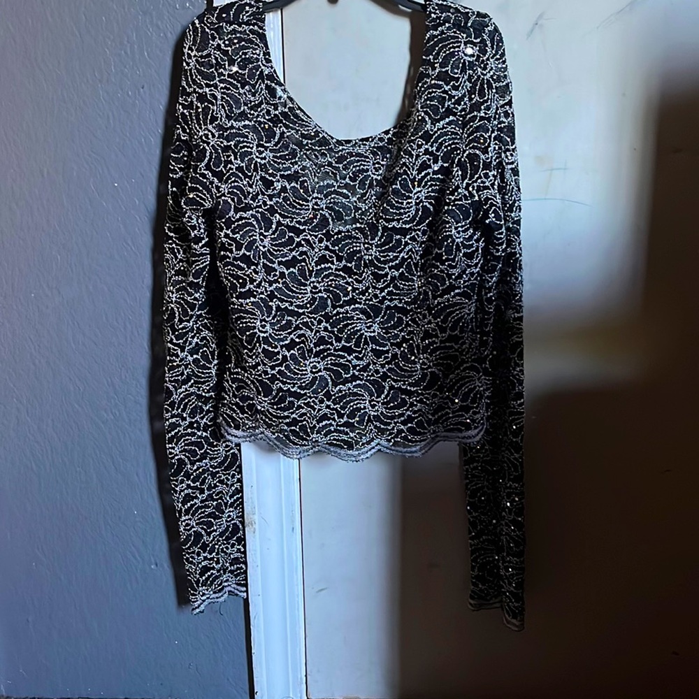 Brand is Jump, sizing is 1/12, color black with silver lining